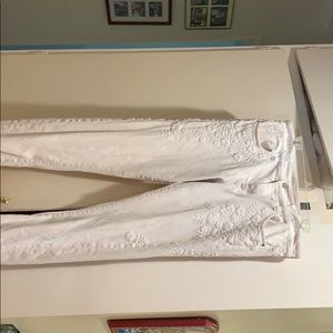 White flower embroidered jeans.